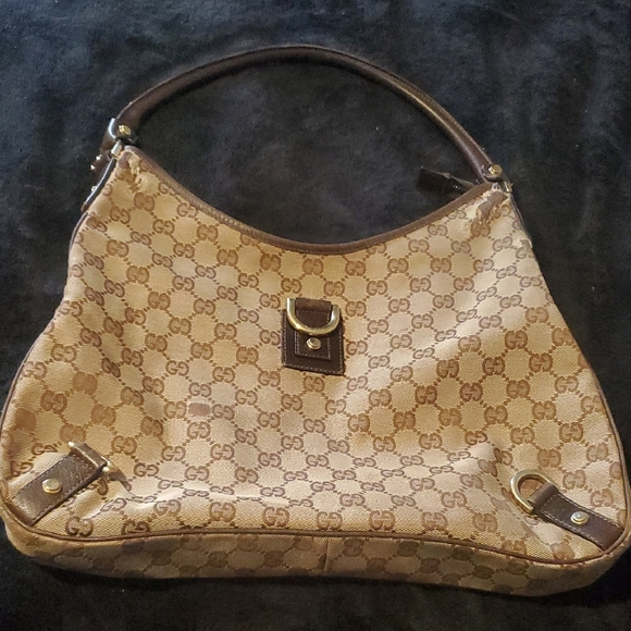 Authentic Gucci Tan and Brown Monogram Shoulder Bag - Picture 1 of 16